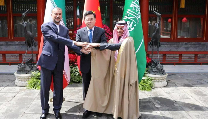 Iranian Foreign Minister Hossein Amir-Abdollahian and Saudi Arabias Foreign Minister Prince Faisal bin Farhan Al Saud and Chinese Foreign Minister Qin Gang shake hands during a meeting in Beijing, China, April 6, 2023. — Reuters