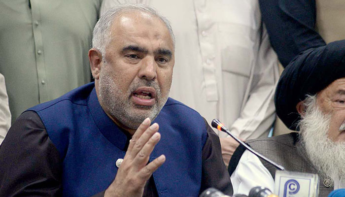 Former National Assembly speaker Asad Qaiser talking to the media in this undated photo. — APP/File