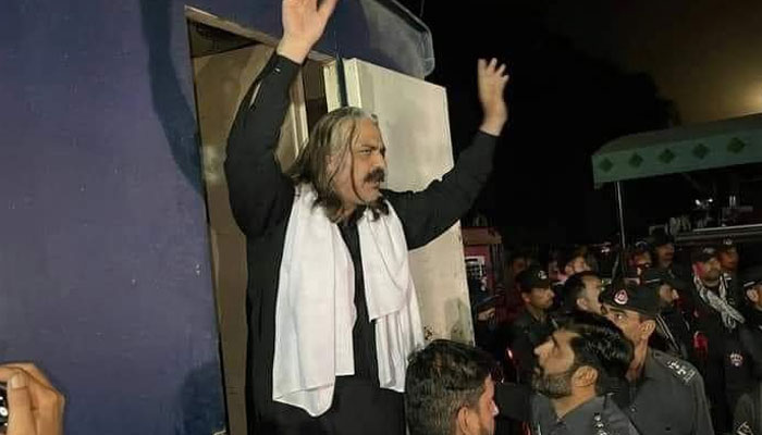 Police take Ali Amin Gandapur into custody in Dera Ismail Khan on March 6, 2023. — Twitter/@Jhagra