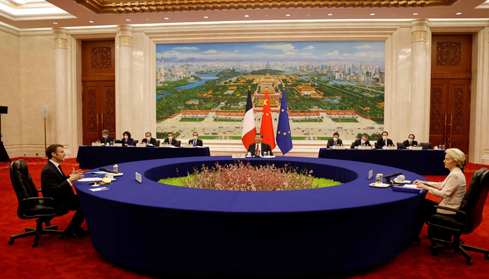 Chinas President Xi Jinping (C), his French counterpart Emmanuel Macron (L) and European Commission President Ursula von de Leyen meet for a working session in Beijing on April 6, 2023. — AFP