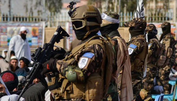 Members of the Taliban Badri 313 unit stand guard as newly-recruited Taliban members who graduated from the Islamic Javadiya Madrassa attend a ceremony in Kandahar. — AFP/File