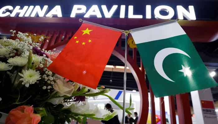 Flags of Pakistan and China are seen at the entrance of the China Pavilion, during the International Defence Exhibition and Seminar IDEAS 2022 in Karachi, Pakistan November 16, 2022. — Reuters