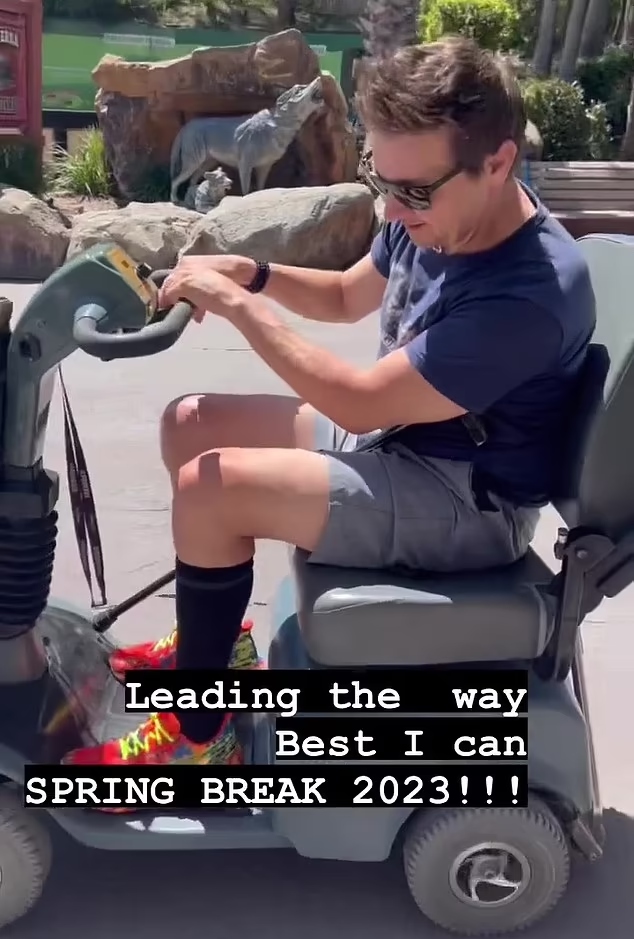 Jeremy Renner joins family on amusement park trip, rides a motorized scooter