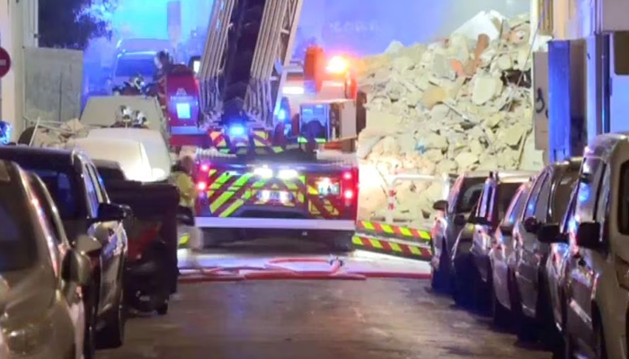 A fire truck stands next to a collapsed building in Marseille, France, on April 9, 2023. — Reuters