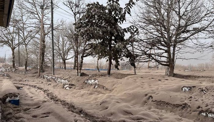 A view shows a street covered in volcanic dust following the eruption of the Shiveluch volcano in the settlement of Klyuchi on the Kamchatka Peninsula, Russia April 11, 2023. — Reuters