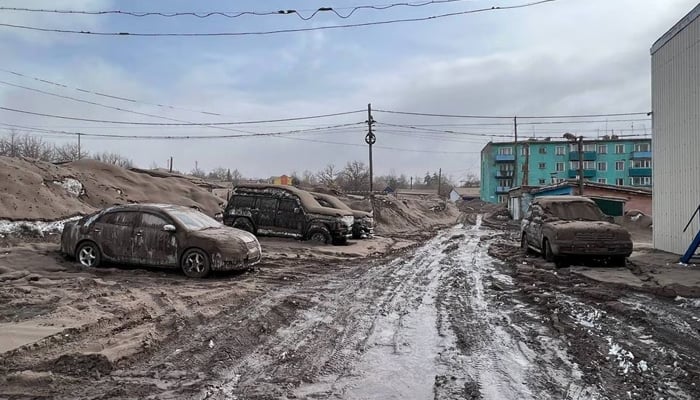 A view shows cars covered in volcanic dust following the eruption of the Shiveluch volcano in the settlement of Klyuchi on the Kamchatka Peninsula, Russia April 11, 2023. — Reuters