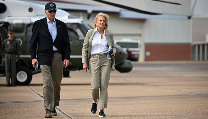 US President Joe Biden and First Lady Jill Biden walk to board Air Force One before departing Jackson-Medgar Wiley Evers International Airport in Jackson, Mississippi, on March 31, 2023. — AFP