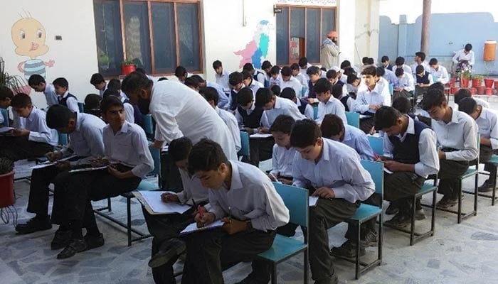 An undated image of students appearing in exams. — AFP