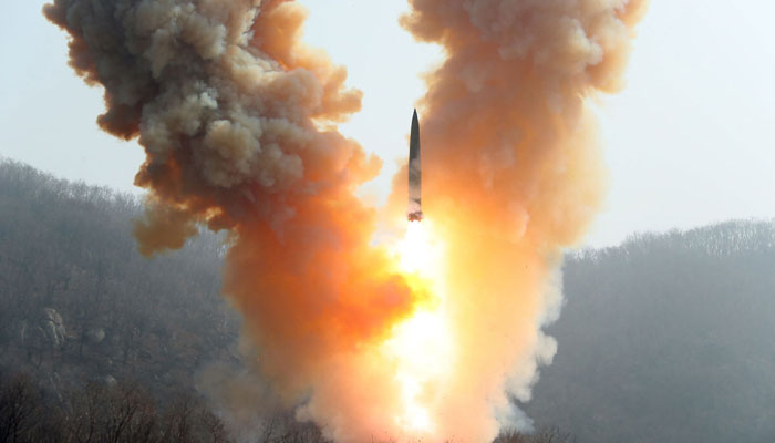 This picture shows a warhead missile launch exercise simulating a tactical nuclear attack in Cholsan County, North Pyongan Province on March 19, 2023. — AFP