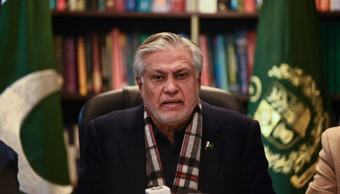 Finance Minister Ishaq Dar speaks during a press conference in Islamabad on February 10, 2023. — AFP