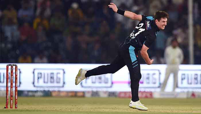 New Zealand´s Matt Henry delivers a ball during the first Twenty20 cricket match between Pakistan and New Zealand at the Gaddafi Cricket Stadium in Lahore on April 14, 2023. — AFP