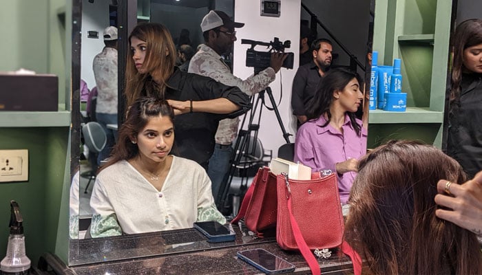 Customers getting services at the newly-opened Tony&Guy salon branch in Karachi. — Photo by reporter