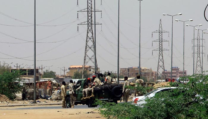 Army soldiers deploy in Khartoum on April 15, 2023, amid reported clashes in the city. — AFP