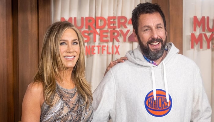 Jennifer Aniston, Adam Sandler react to reporter's height in resurfaced ...