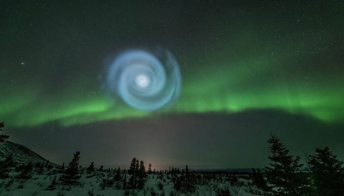 A picture from photographer Todd Salat showing a swirl in the sky while photographing the aurora near the Richardson Highway on April 15, 2023. — Anchorage Daily News