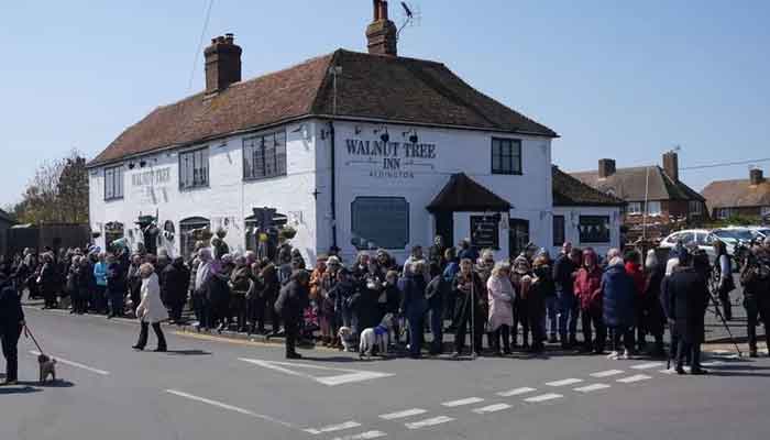 Paul OGrady funeral: Fans and dogs line streets to pay tribute to animal-loving star
