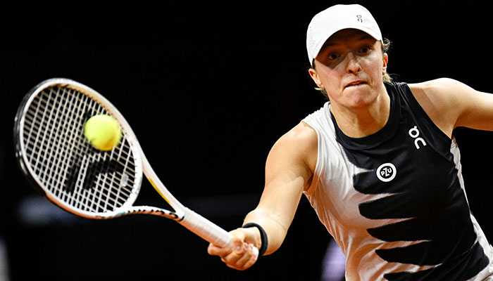 Polands Iga Swiatek returns the ball to Czech Republics Karolina Pliskova during their quarter-final match at the Womens Tennis Grand Prix WTA tournament in Stuttgart, southwestern Germany, on April 21, 2023. AFP