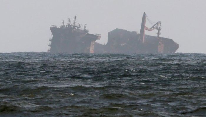 A vessel sinks while being towed into the deep sea off the Colombo Harbour. — Reuters/File