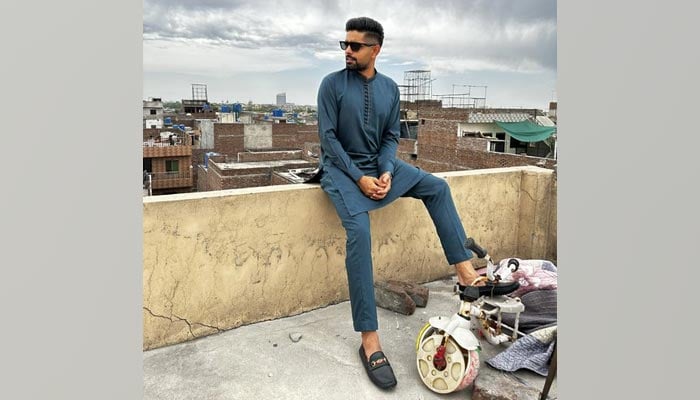 Pakistan cricket team skipperBabar Azam poses for a picture taken at his childhood home on April 22, 2023. — Twitter/babarazam258