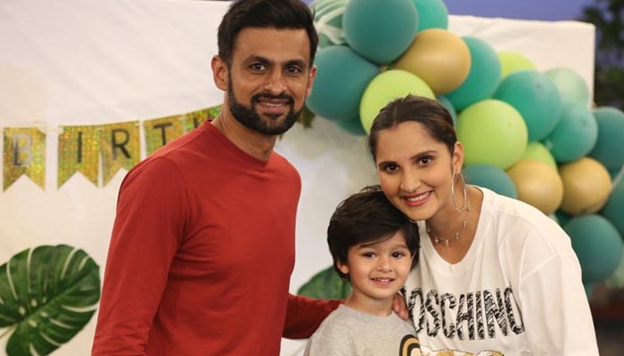 Pakistan cricketer Shoaib Malik (L) poses for a picture with wife Sania Mirza and son Izhan Mirza-Malik in this undated image. — Instagram/@mirzasaniar
