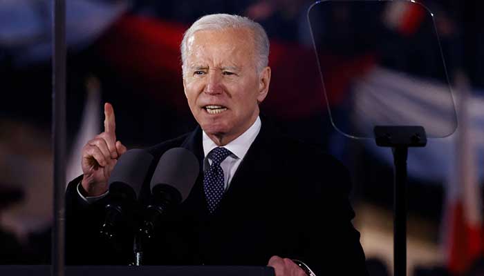 US President Joe Biden speaks at the Royal Warsaw Castle Gardens in Warsaw, Poland on February 21, 2023. — AFP