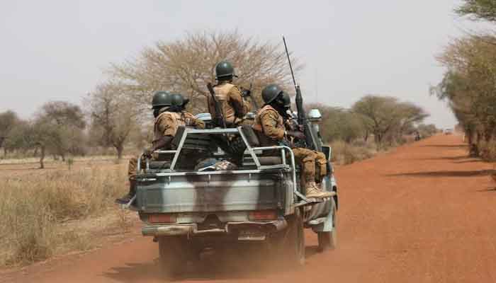 Soldiers from Burkina Faso patrol on the road of Gorgadji in the Sahel area, Burkina Faso March 3, 2019. Picture taken March 3, 2019. — Reuters