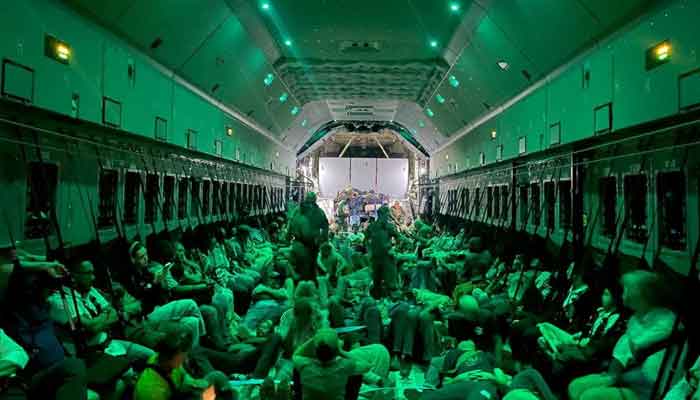 Spanish diplomatic personnel and citizens wait to disembark a military plane after they were evacuated from Sudan, in Djibouti, Djibouti, April 24, 2023. —Reuters
