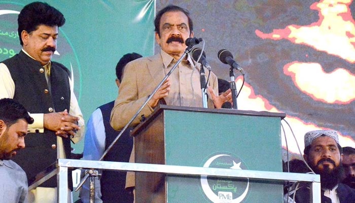 Interior Minister Rana Sanaullah Khan addressing PML-N Workers Convention at Al- Fateh Sports Complex on March 10, 2023 in Faisalabad. — APP