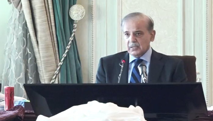 Prime Minister Shehbaz Sharif addresses a meeting of coalition partners in Islamabad on April 26, 2023, in this still taken from a video. — YouTube/GeoNews