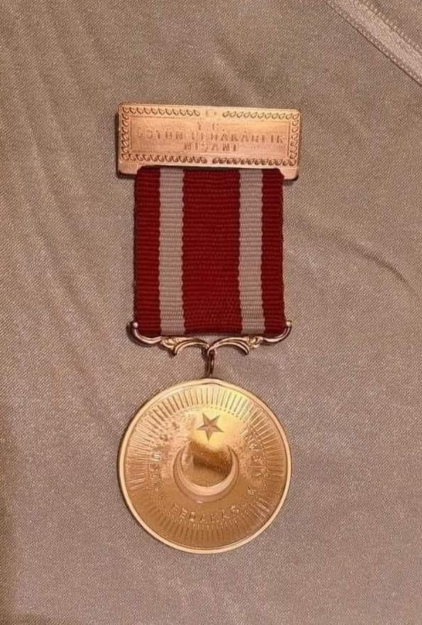 Medal awarded to the charity. — Alkhidmat Foundation