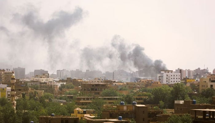 Smoke rises over buildings during clashes between the paramilitary Rapid Support Forces and the army in Khartoum, Sudan April 17, 2023. — Reuters