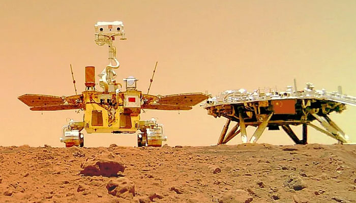 Chinas Zhurong Mars Rover, Chinas first Mars rover, Zhurong, is pictured next to its landing platform on the surface of the red planet. — CNSA/File