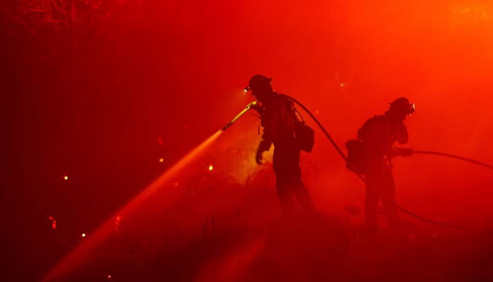 Firefighters work as the Mosquito Fire burns in Foresthill, California, U.S., September 13, 2022. —Reuters