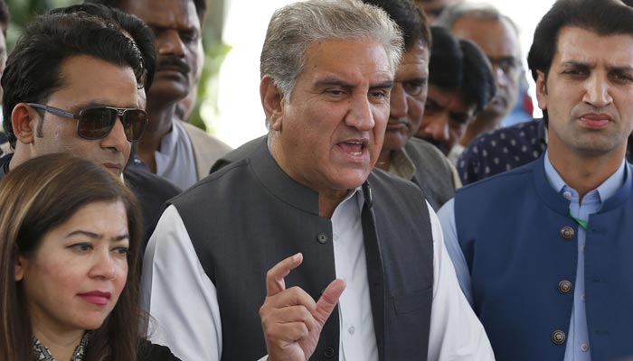 PTI Vice Chairman Shah Mahmood Qureshi talking to media persons outside the Supreme Court building on April 7, 2022. — Online