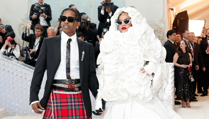 Rihanna elegantly graces the 2023 Met Gala in all-white with A$AP Rocky