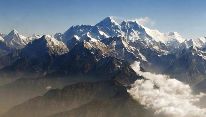 Mount Everest (C), the worlds highest peak, and other peaks of the Himalayan range are seen from the air during a mountain flight from Kathmandu. — Reuters/File