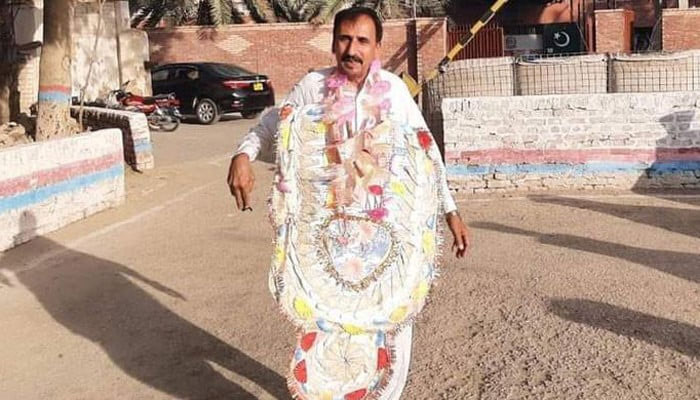 Khairpur schoolteacherSarang Sher outside a court house in this undated photo. — Twitter/File