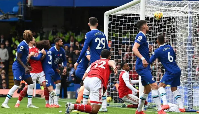 Arsenals Brazilian defender Gabriel Magalhaes scores his teams first goal during the English Premier League football match between Chelsea and Arsenal at Stamford Bridge in London on November 6, 2022. AFP/File