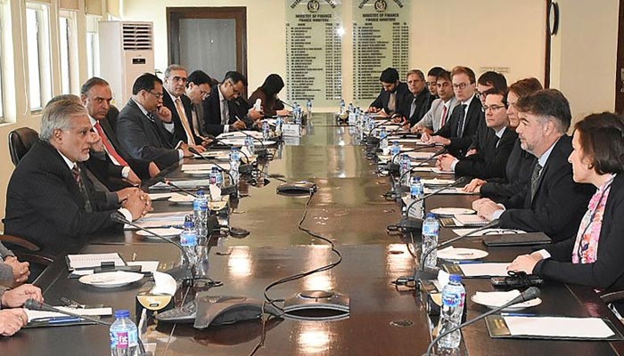 A handout photo released by the Press Information Department (PID) on January 31, 2023 shows government officials and IMF team holding bailout talk. — PID