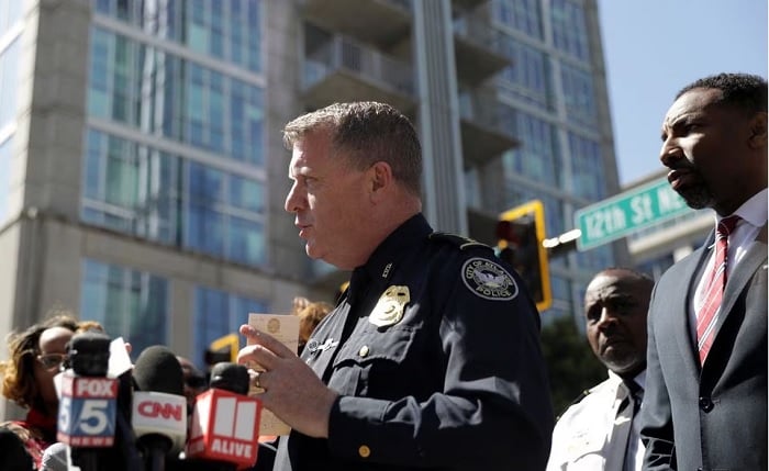 Atlanta Police Chief Darin Schierbaum delivers remarks next to Atlanta Mayor Andre Dickens as they attend a press conference after reports of several casualties from a gunman in a downtown hospital in Atlanta, Georgia, May 3, 2023.— Reuters