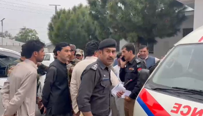 Police personnel at a school in Upper Kurram Tehsil, Khyber Pakhtunkhwa, on May 4, 2023, in this still taken from a video. — GeoNews