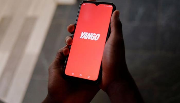 A person checks the Yango taxi app on a phone, in Dakar, Senegal March 13, 2022. — Reuters