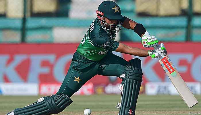 Pakistan´s captain Babar Azam plays a shot during the third one-day international (ODI) cricket match between Pakistan and New Zealand at the National Stadium in Karachi on May 3, 2023. — AFP