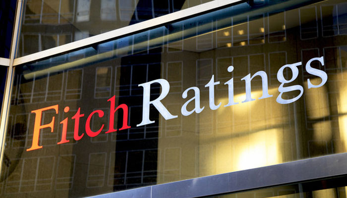 The logo of Fitch Ratings can be seen above the main entrance of their office building. — Reuters/File