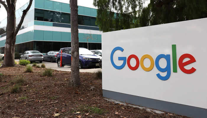 A sign is posted in front of an office at Google headquarters on February 02, 2023 in Mountain View, California. — AFP