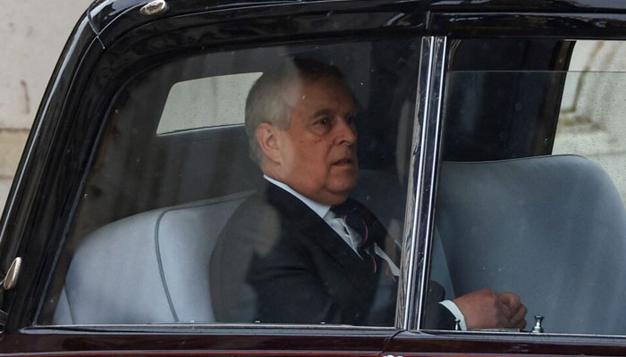 Prince Andrew was booed by Coronation revellers as he made his way out of Buckingham Palace