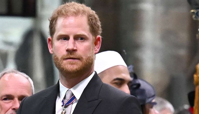 Prince Harry seemed to have a poignant moment of ‘sadness’ as his father King Charles passed him at the Coronation