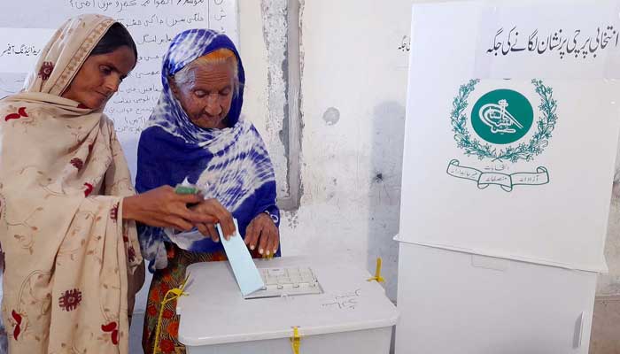 Women cast their votes at a polling station in Sukkur during the local bodies by-polls held on Sunday, May 7, 2023. — PPI