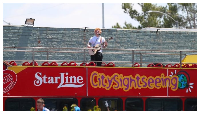 Ed Sheeran delights fans with a free show onboard tourist bus