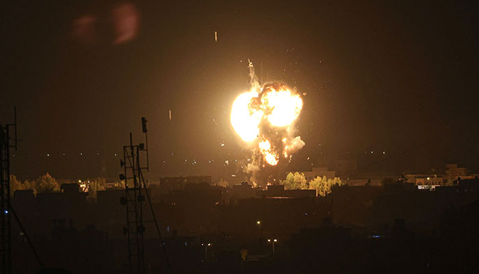 Smoke and flames rise above buildings after an Israeli airstrike in Rafah, southern Gaza Strip, on May 3, 2023. —AFP/file